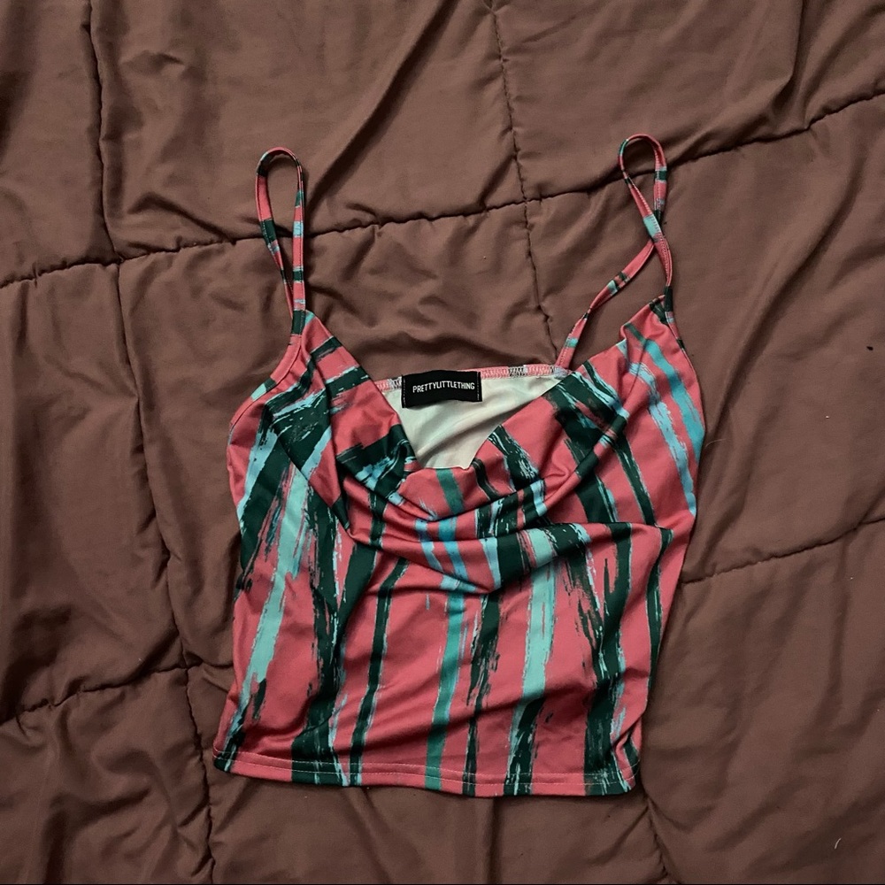 Crop top Pink &’ green pretty little thing , drop low in the front
